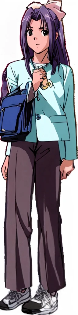 Momoko Koigakubo is standing in a light blue outfit and brown trousers.。