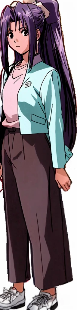 Momoko Koigakubo is standing in a light blue outfit and brown trousers.。
