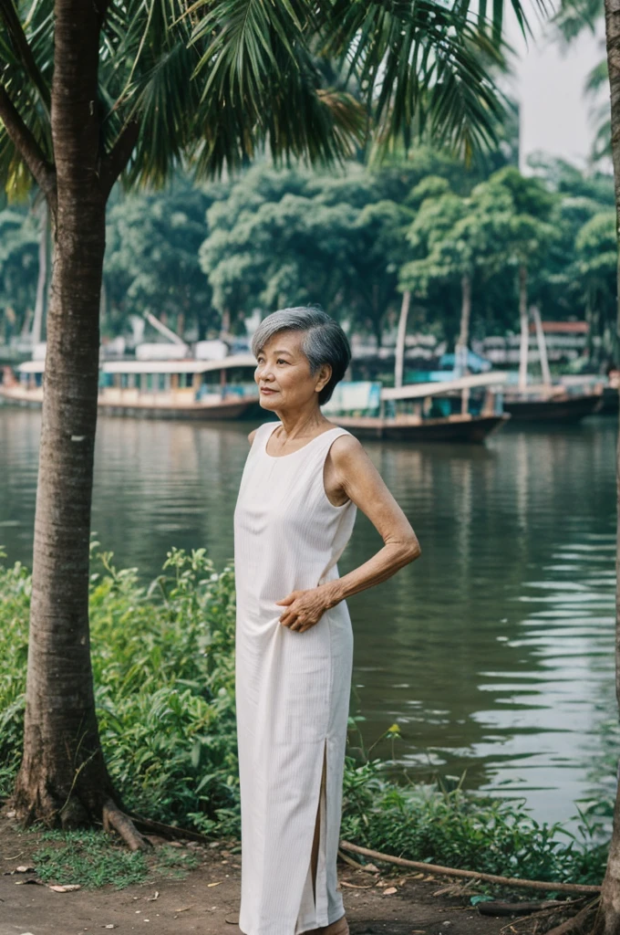 Khin Than Nu, RAW PHOTO, her name is Chariya, high quality, 1 old woman, ((58-year-old slim THAI woman)), (((58 years old))), ((slim body)), ((wrinkled body)), (((old body))), (((short hair))), she is wearing a fashionable stylish Generation X wear different colors, POSE: standing, BREAK, BACKGROUND: outdoor, Along the tranquil banks of the Chao Phraya River, film grain