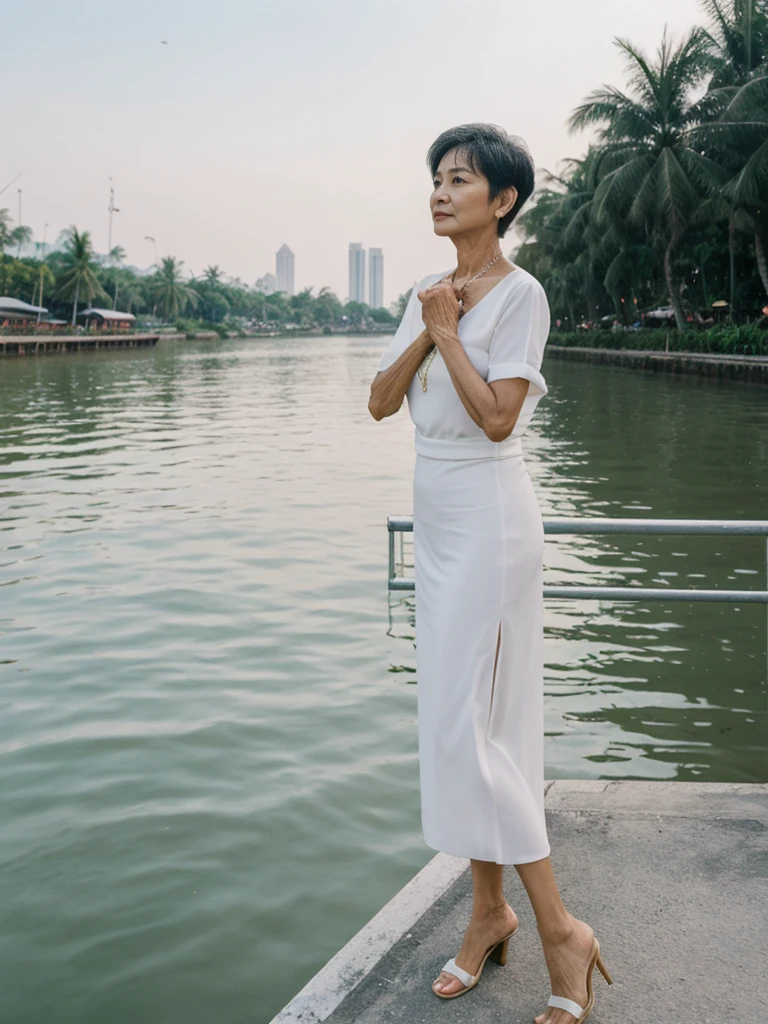 Khin Than Nu, RAW PHOTO, her name is Chariya, high quality, 1 old woman, ((58-year-old slim THAI woman)), (((58 years old))), ((slim body)), ((wrinkled body)), (((old body))), (((short hair))), she is wearing a fashionable stylish Generation X wear different colors, POSE: standing, BREAK, BACKGROUND: outdoor, Along the tranquil banks of the Chao Phraya River, film grain
