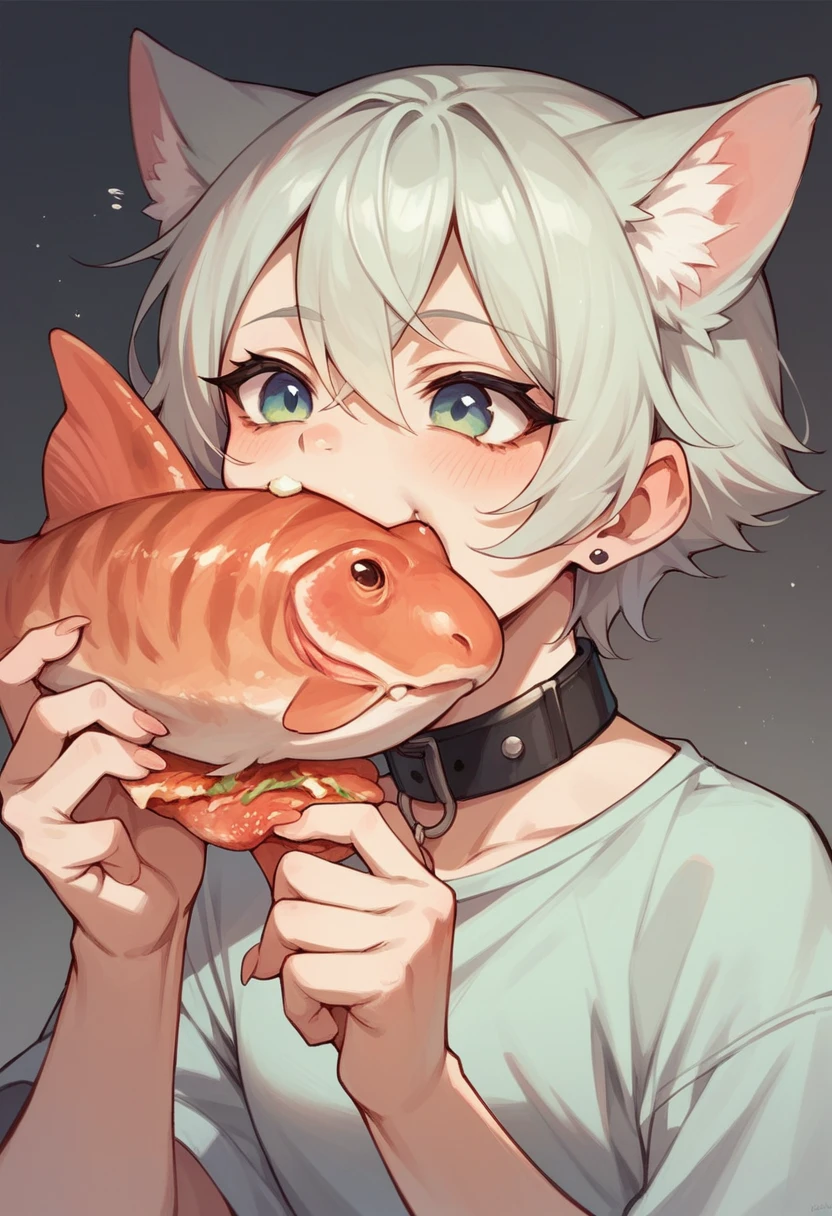 Cat eating fish