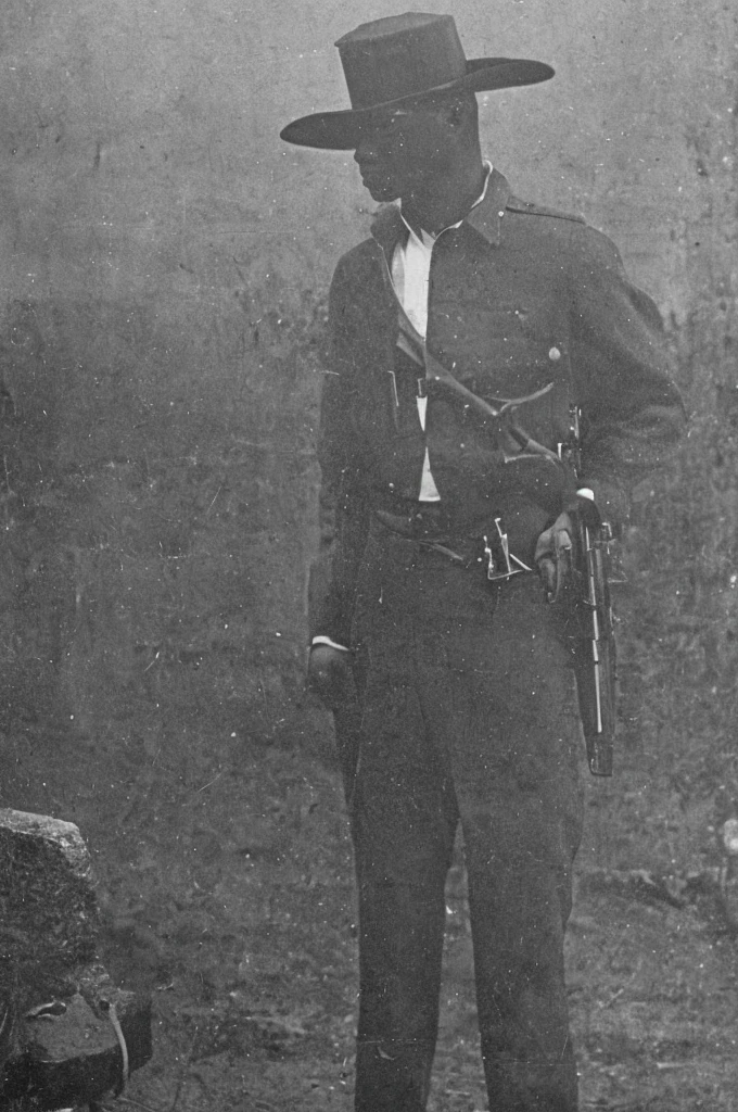A detainee with his pistol black and white image