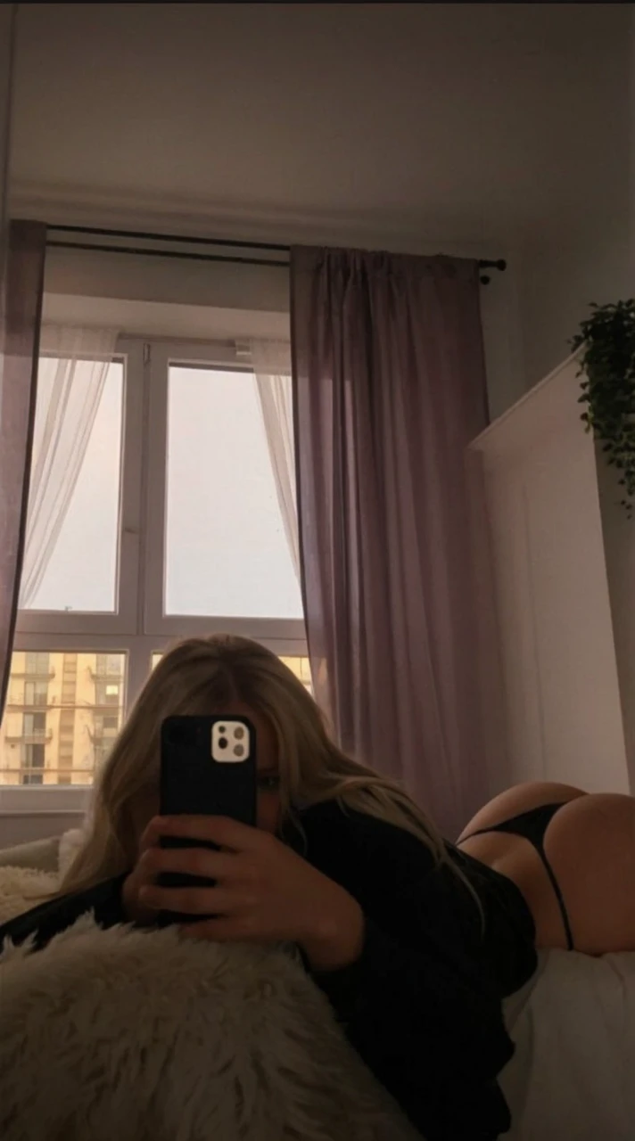 Blonde girl with black thong