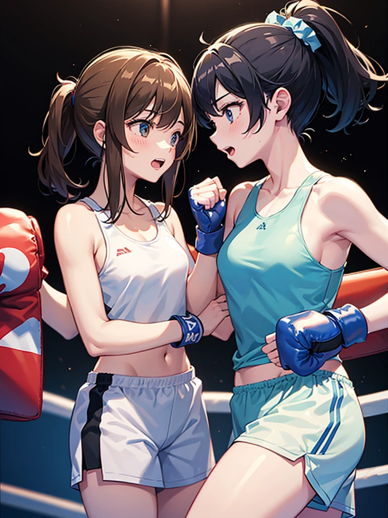 Two girls boxing in the ring