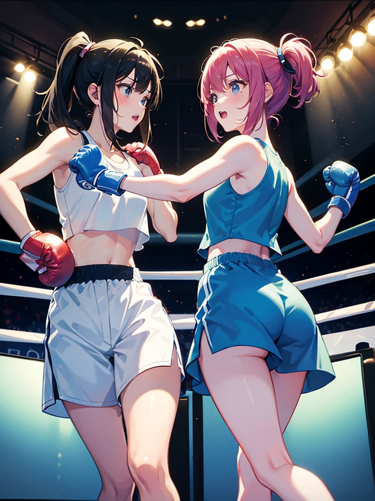 Two girls boxing in the ring