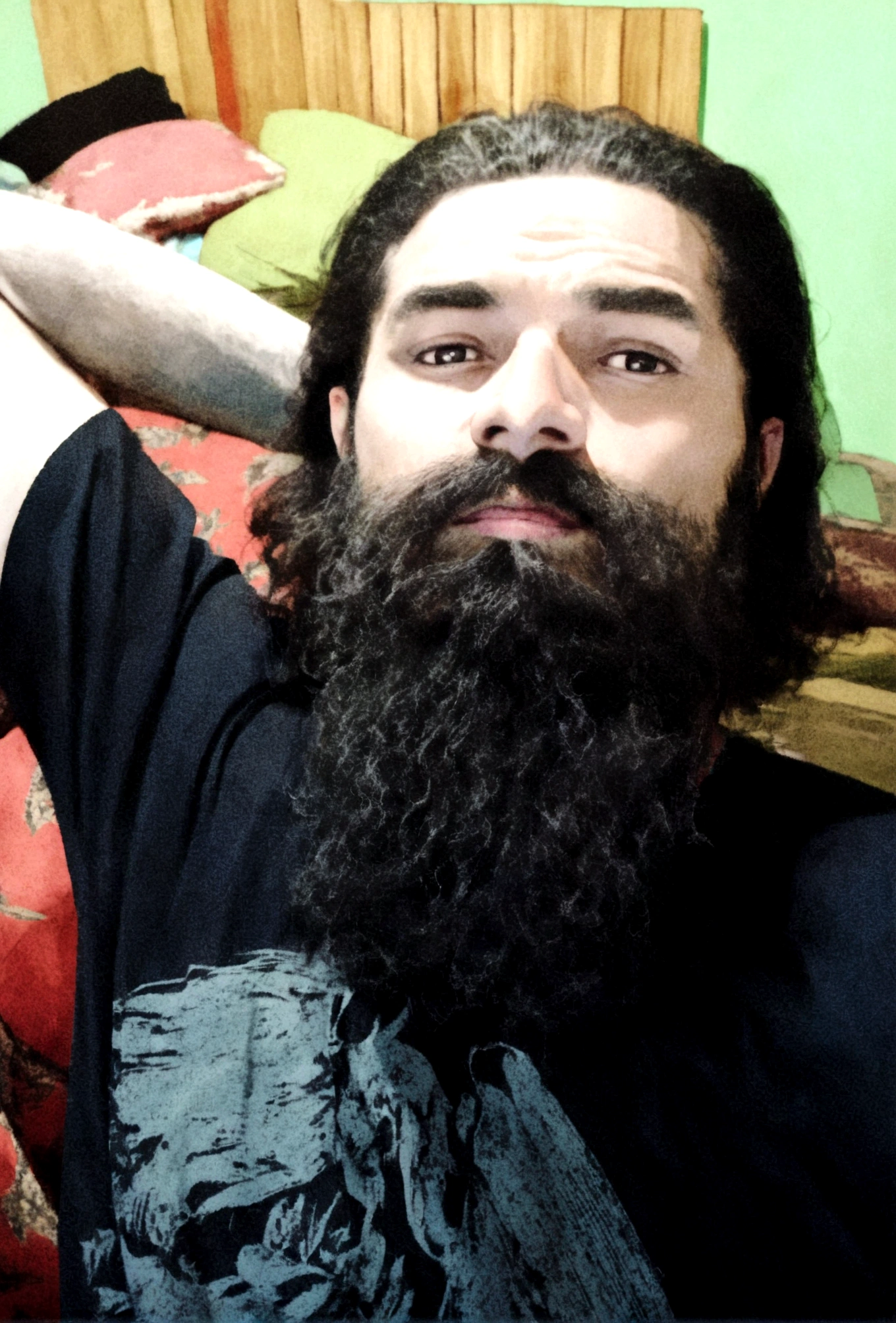 man with long beard, medium hair with a gradient background