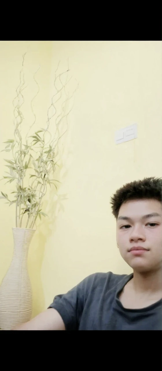 in a white shirt、The Arafed man in a black tie stands in front of a bamboo tree, very very low quality picture, in style of thawan duchanee, thawan duchanee, in style of lam manh, hoang long ly, nice afternoon lighting, dang my linh, mid shot portrait, 8k selfie photograph, A picture