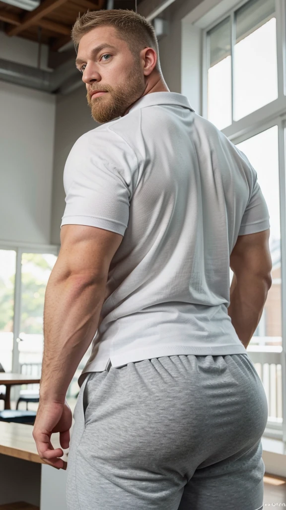 Backshot of a Giant muscular man, 30 years old, mature, glaring at the camera, blue eyes, short blond hair, a full grown blond beard, bulky body, thick arms, thick legs, thick thighs, wearing white polo shirt, grey sweatpants, stocky, wide build, Massive bara man, masculine face, massive butt