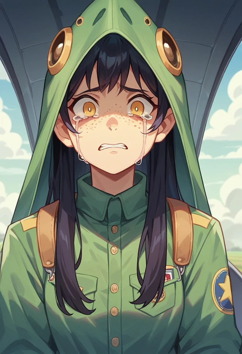 screenshot of my hero academy. girl blue and black long hair, yellow eyes and freckles on her face. in a downward looking plane, crying uncontrollably while her hands are covering her ears while she cries a thousand tears in her face.