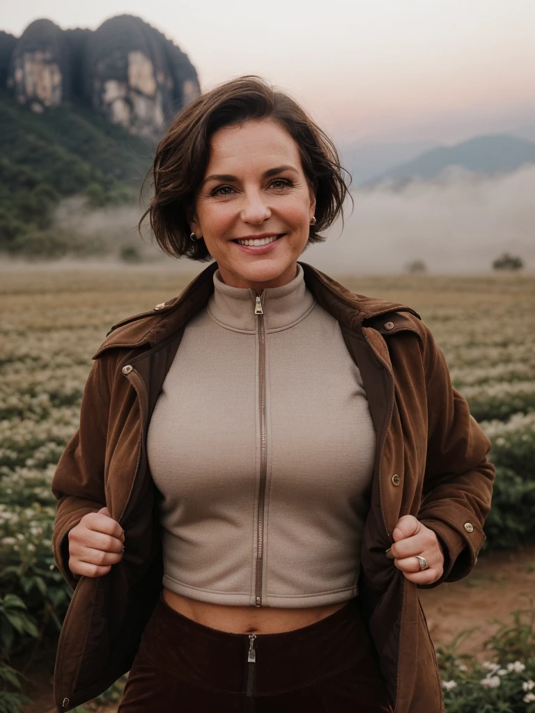 1 girl, photorealistic, realistic, her name is Elise, middle age, a 45-year-old woman with gray hair, body of 45-year-old woman, wrinkles on her face and body, Alpine woman, ((dark brown hair, short hair))), smiling,(((dynamic pose))), nudity, (((The quiet mountains are shrouded in a sea of mist.,Stunning sunrise casting warm hues,Beautiful flowers bloomed in front of us.,The atmosphere is dreamy and peaceful.,Beautiful landscape of Thailand,Harmony between nature and humanity))), (((she choose a cropped corduroy jacket is tailored with a slightly boxy silhouette, featuring a plush texture and a rich color like brown. Its cropped length accentuates the waistline and adds structure to the ensemble. There is no top beneath the jacket, she paired it with color black high-waisted cycling shorts in a sleek, stretchy fabric that conforms to her figure))), (((but out)))
