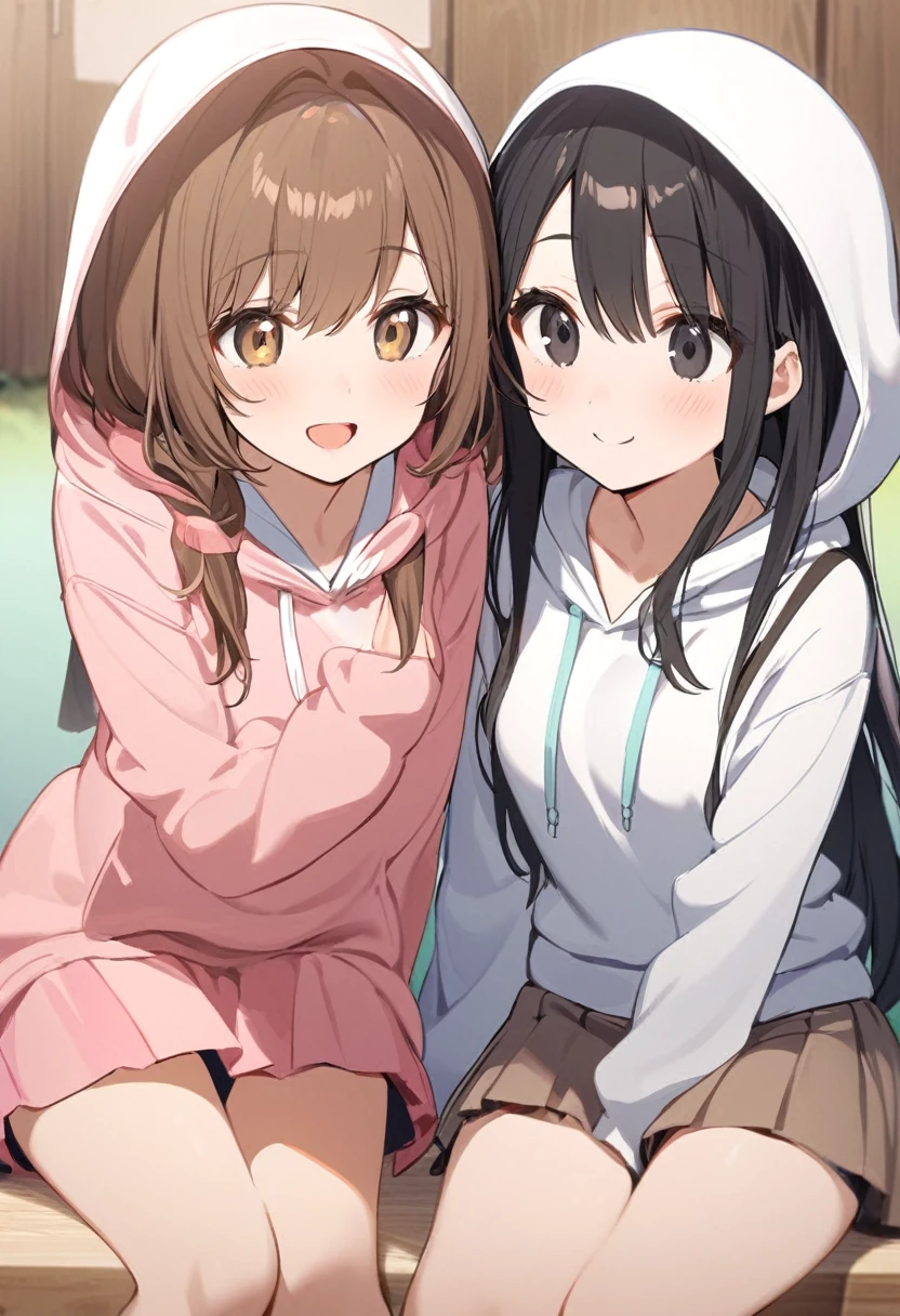  Two girls.Brown hair and hazel eyes.2 black hair and black eyes .She wears a hoodie and skirt.She smiles softly.