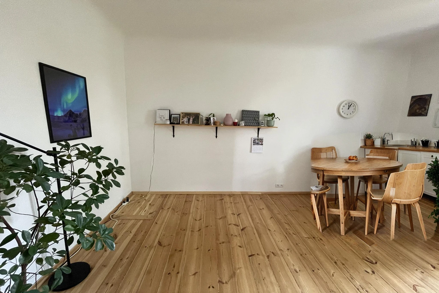 round wooden table with chairs