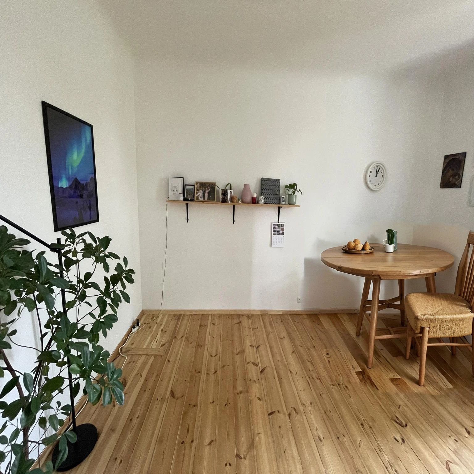small round wooden table with chair