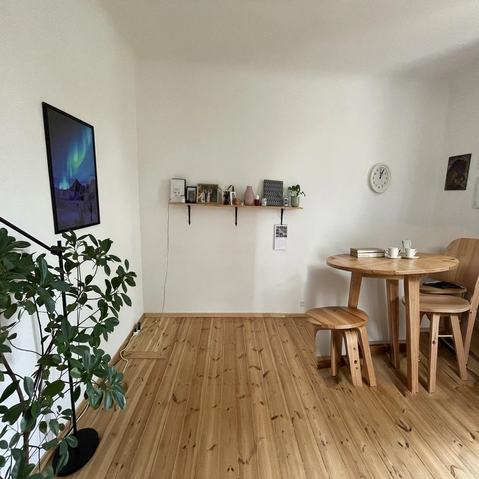 small round wooden table with chair
