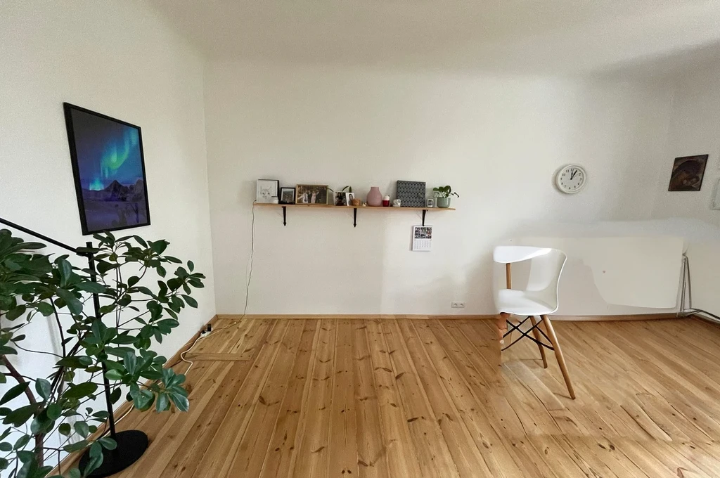 round wooden table with chair
