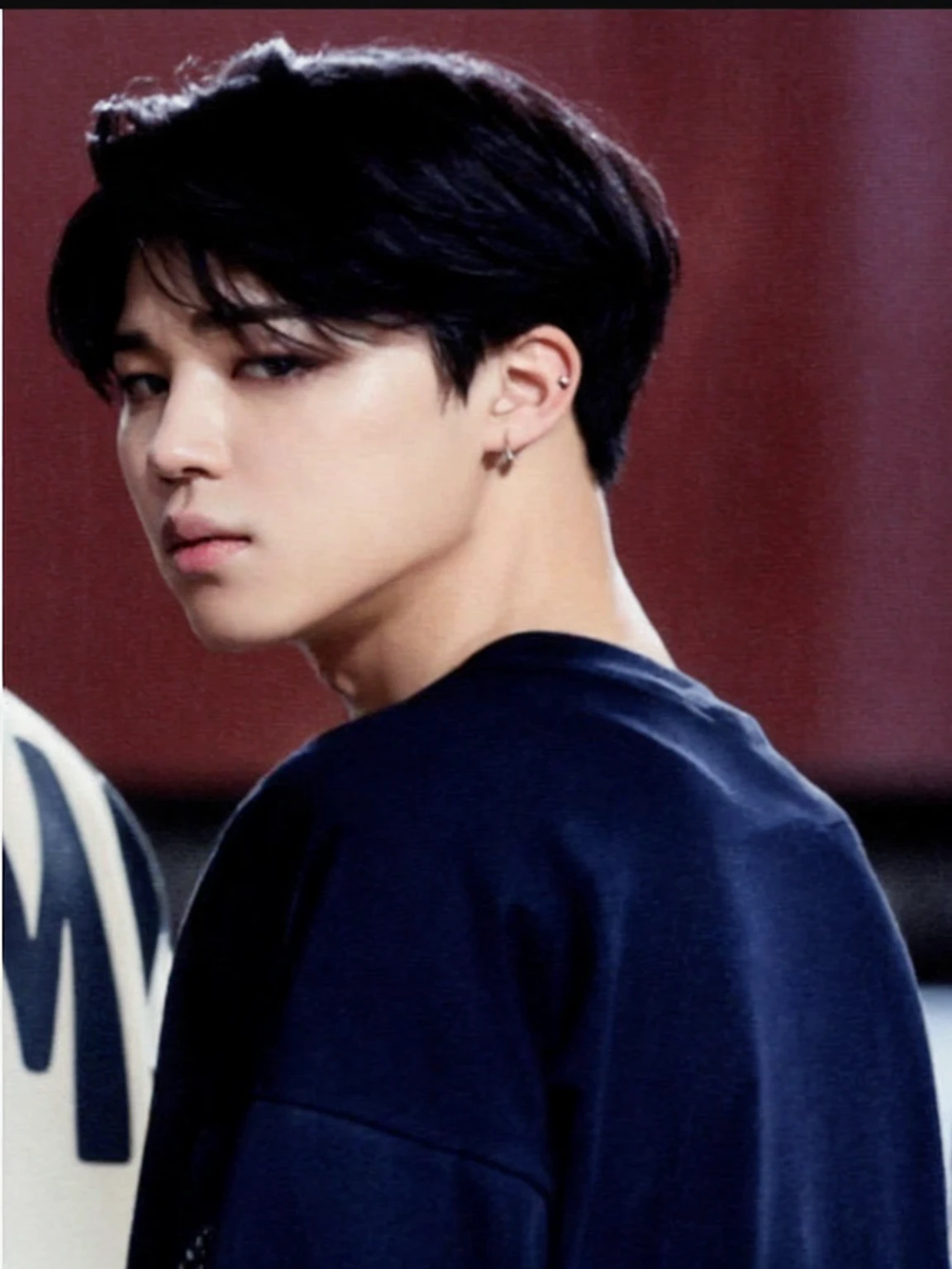 blurred image of a young man in a black shirt and a white surfboard, Jimin\greek nose, Jimin\fleshy lips, Jungkook, Jimin\the right eyelid is swollen, park jimin, Jimin, Jimin's precise face, Yoongi de cabelos pretos, hyung tae, Tae June Kim, cai xukun, BTS, beautiful young prince