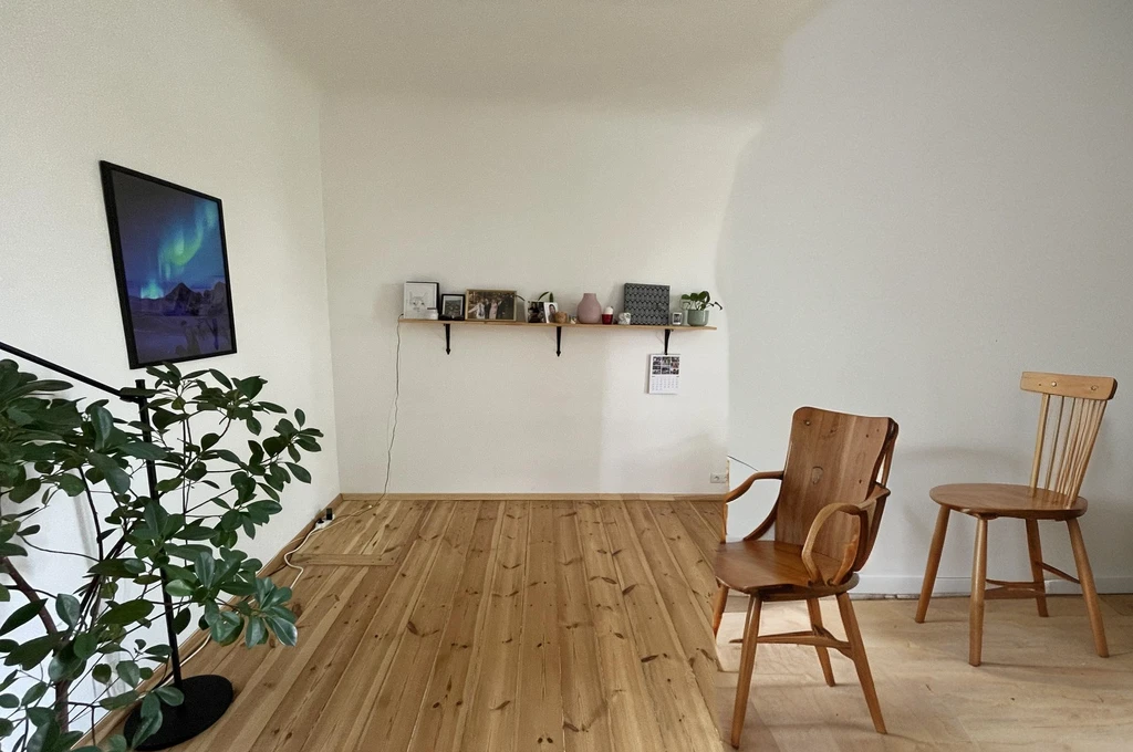small round wooden table with chairs