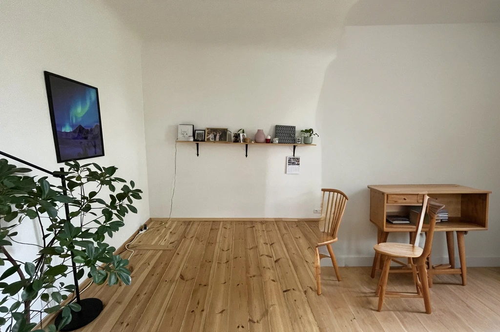 small round wooden table with chairs