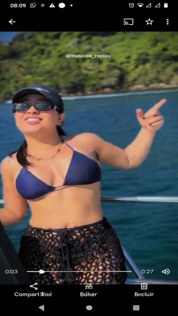 Brunette black bikini mini skirt