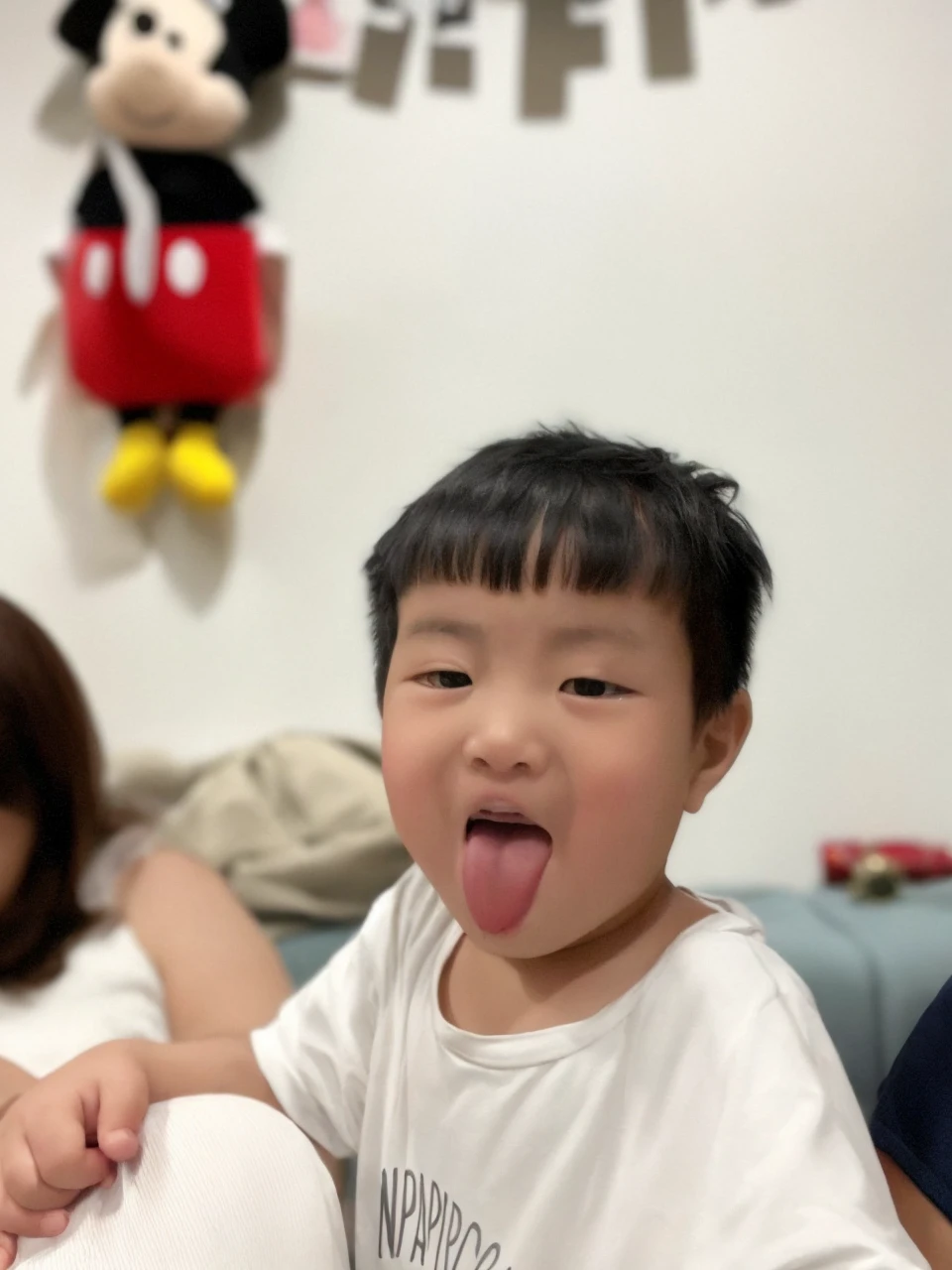 there is a baby sitting in a chair eating a piece of food, with cute doting eyes, she has a cute expressive face, wan adorable korean face, ruan cute vtuber, cute pout, , cute expression, she has a cute face, dang my linh, ruan jia beautiful!, innocent look, nivanh chanthara --auto