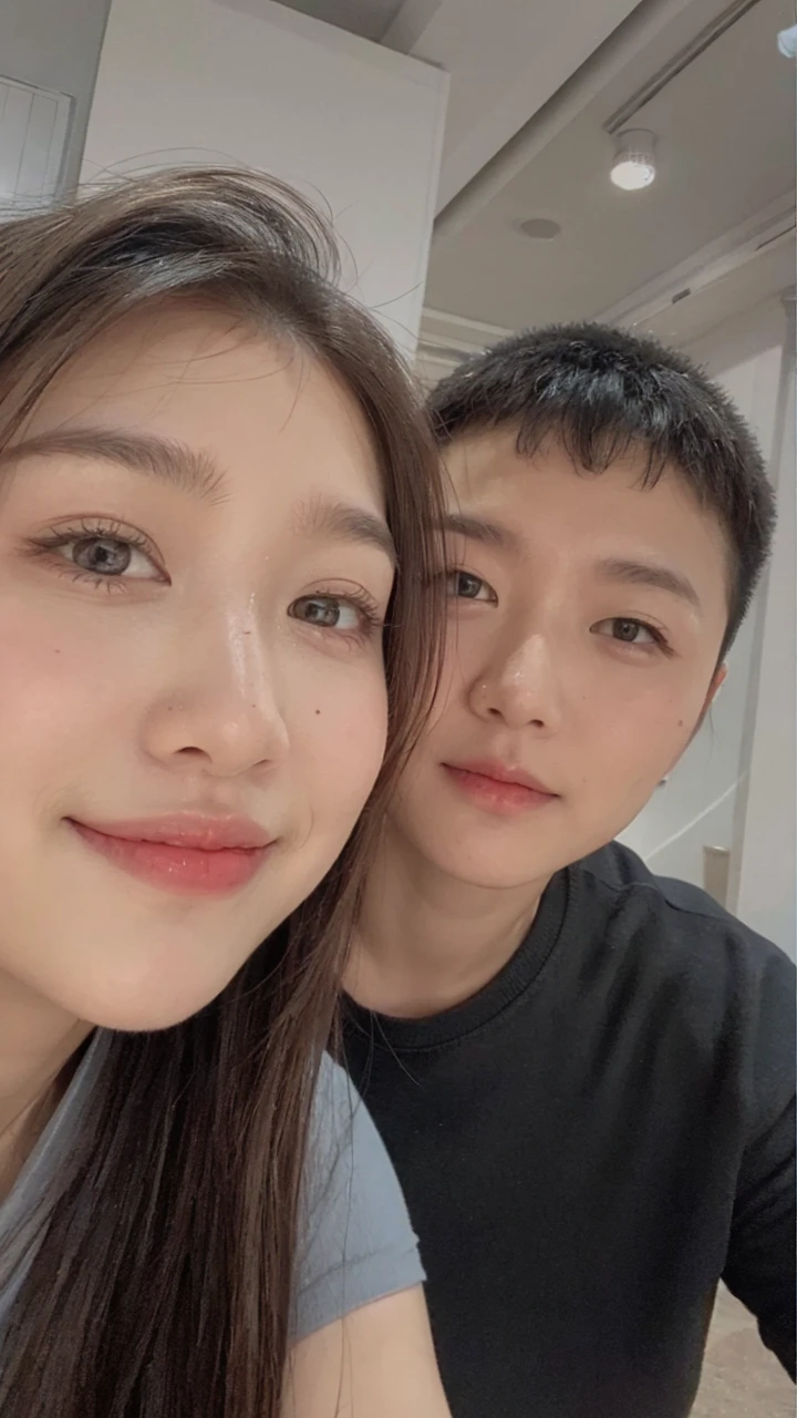 there are two people posing for a picture in front of a tree, ruan jia and fenghua zhong, lovely couple, ruan jia and brom, 2 , 2 9 years oldinh, with ivy, 2 7 years old, couple, h, yanjun chengt, 3 2 years old, hoang long ly