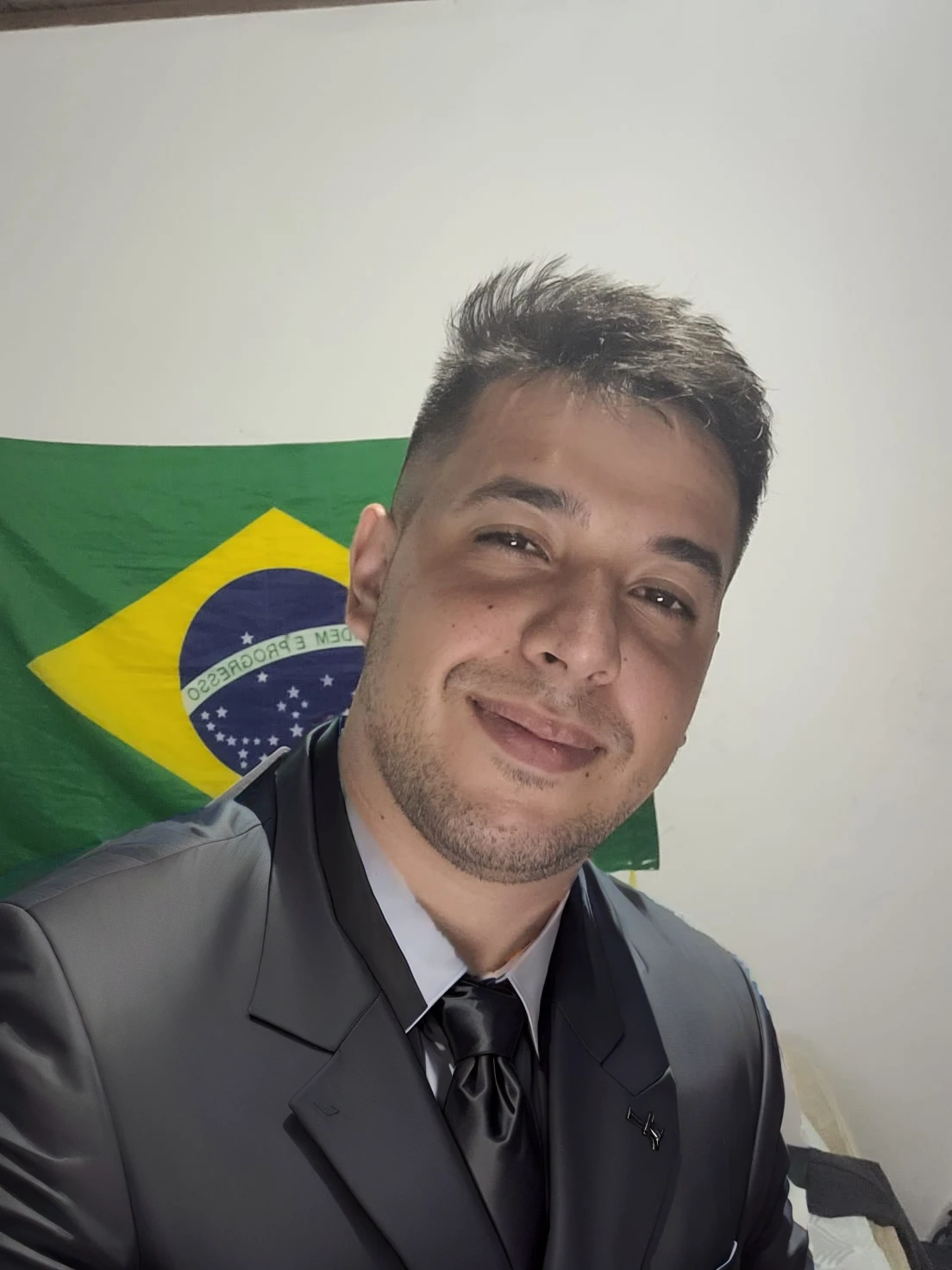 put on a black suit with a tie