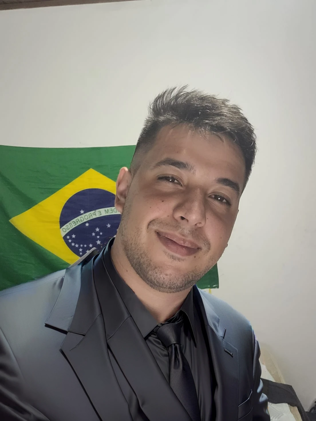 put on a black suit with a tie