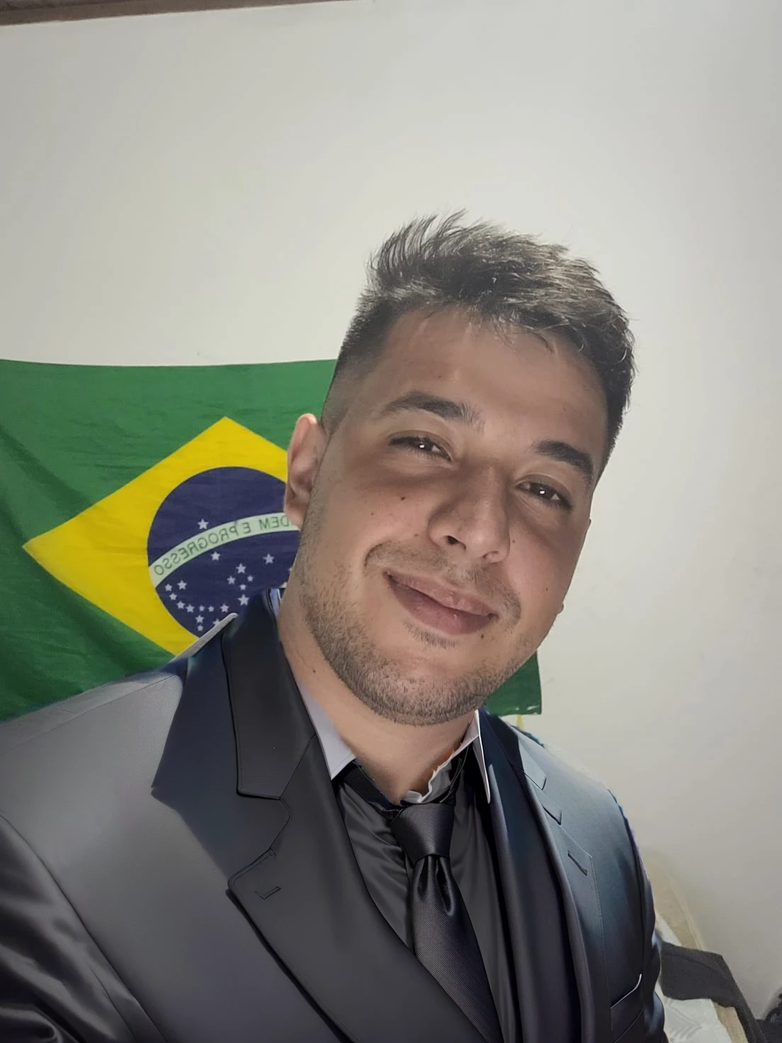 put on a black suit with a tie
