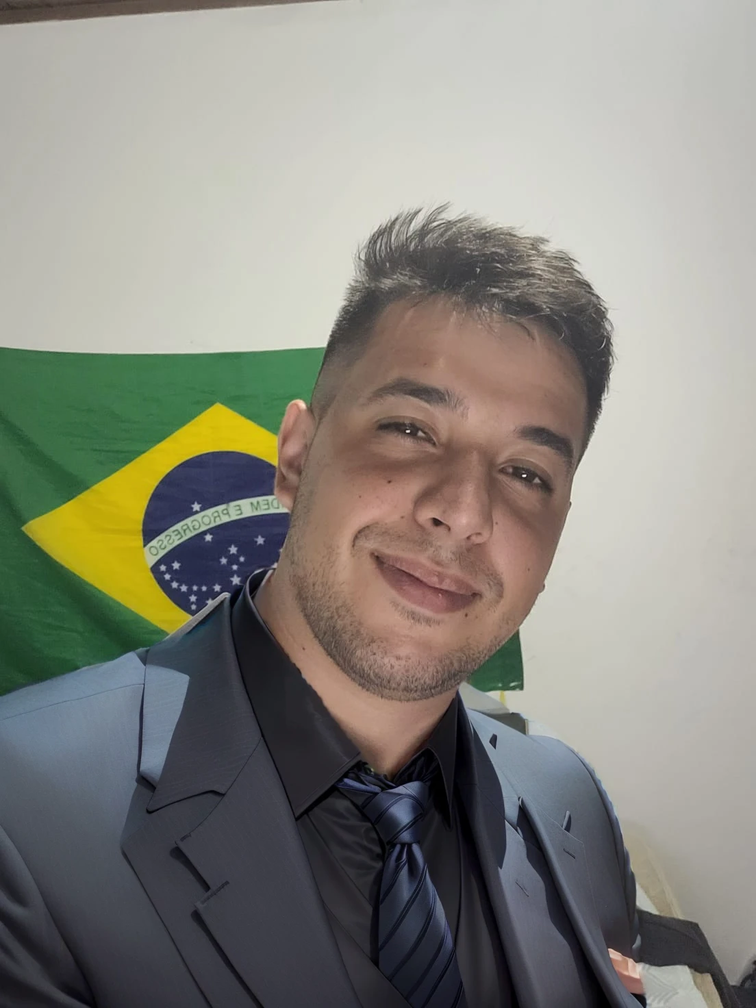 put on a black suit with a tie