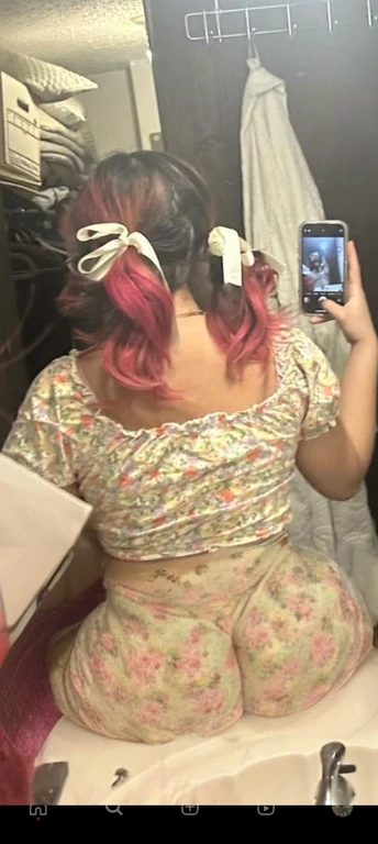 woman with pink hair taking a picture of herself in the mirror, wearing pink hair bow, pigtails, colorful pigtail, wearing underwear, with pink hair, wearing pink panties, back of the hair, roses in her hair, pink hair covered with hairpins, view from the back, curvy and bow, shot from the back, thick bow, insanely inflated hips, beautiful girl, big ass, huge ass, bbw, from behind, thick, thick thighs, wide hips, bbw, big , sideboob, giant ass, side view, big butt, round butt, tight underwear, underwear halfway off, underwear taking off, grabbing ass, ass spilling over underwear, too thick for clothes, side angle, chubby stomach, big , filipina, naked fat ass on sink riding a dildo