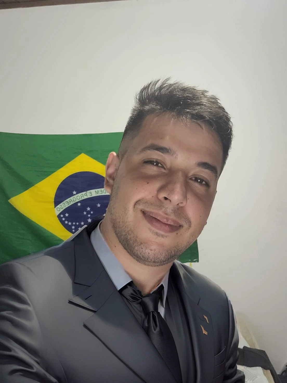 put on a black suit with a tie
