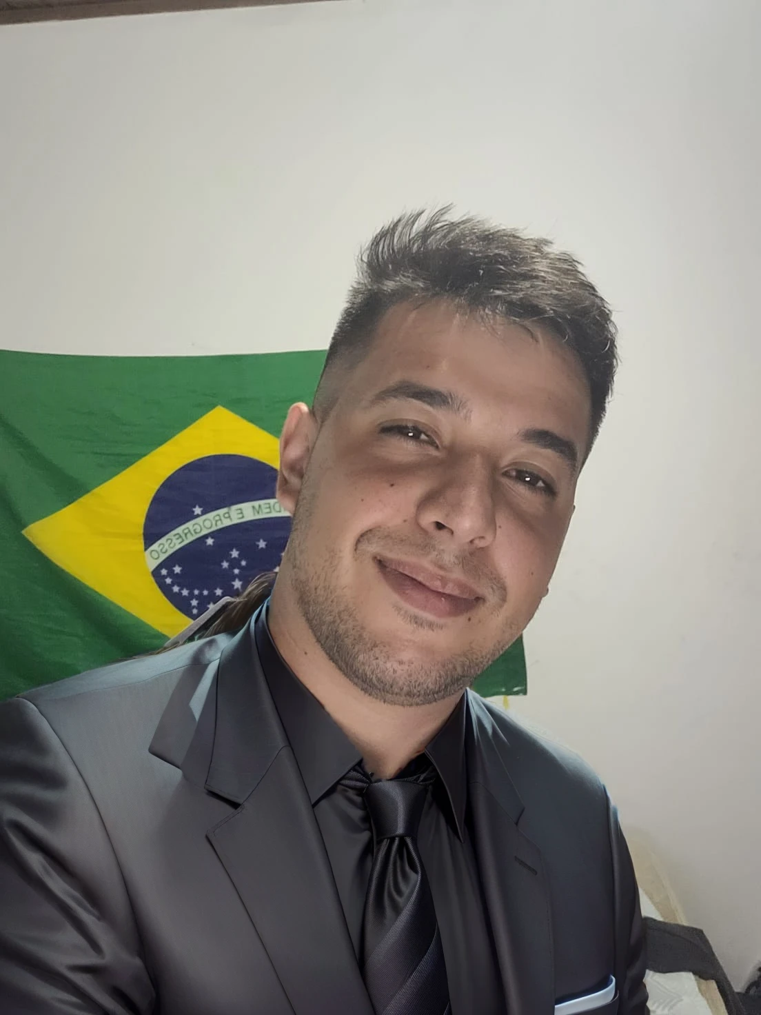 put on a black suit with a tie