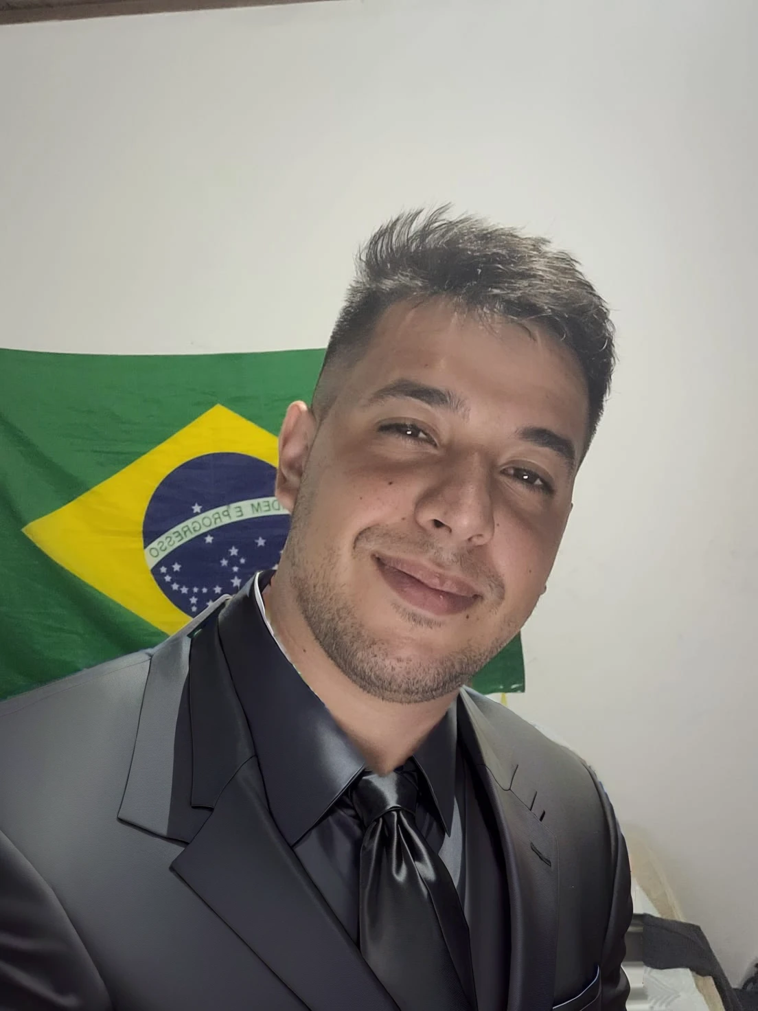 put on a black suit with a black tie