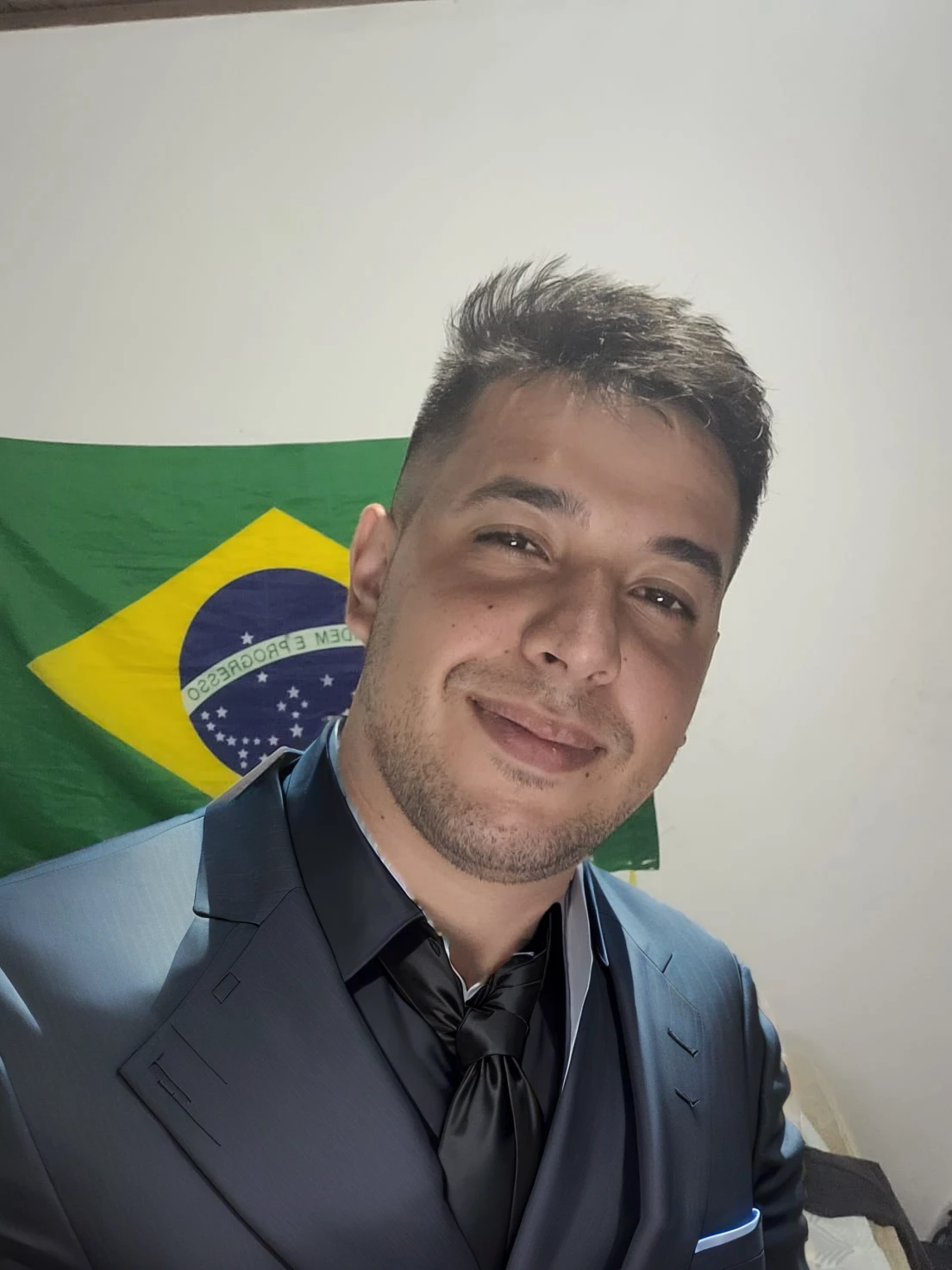 put on a black suit with a black tie