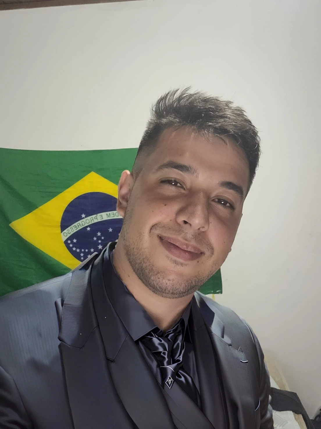 put on a black suit with a black tie