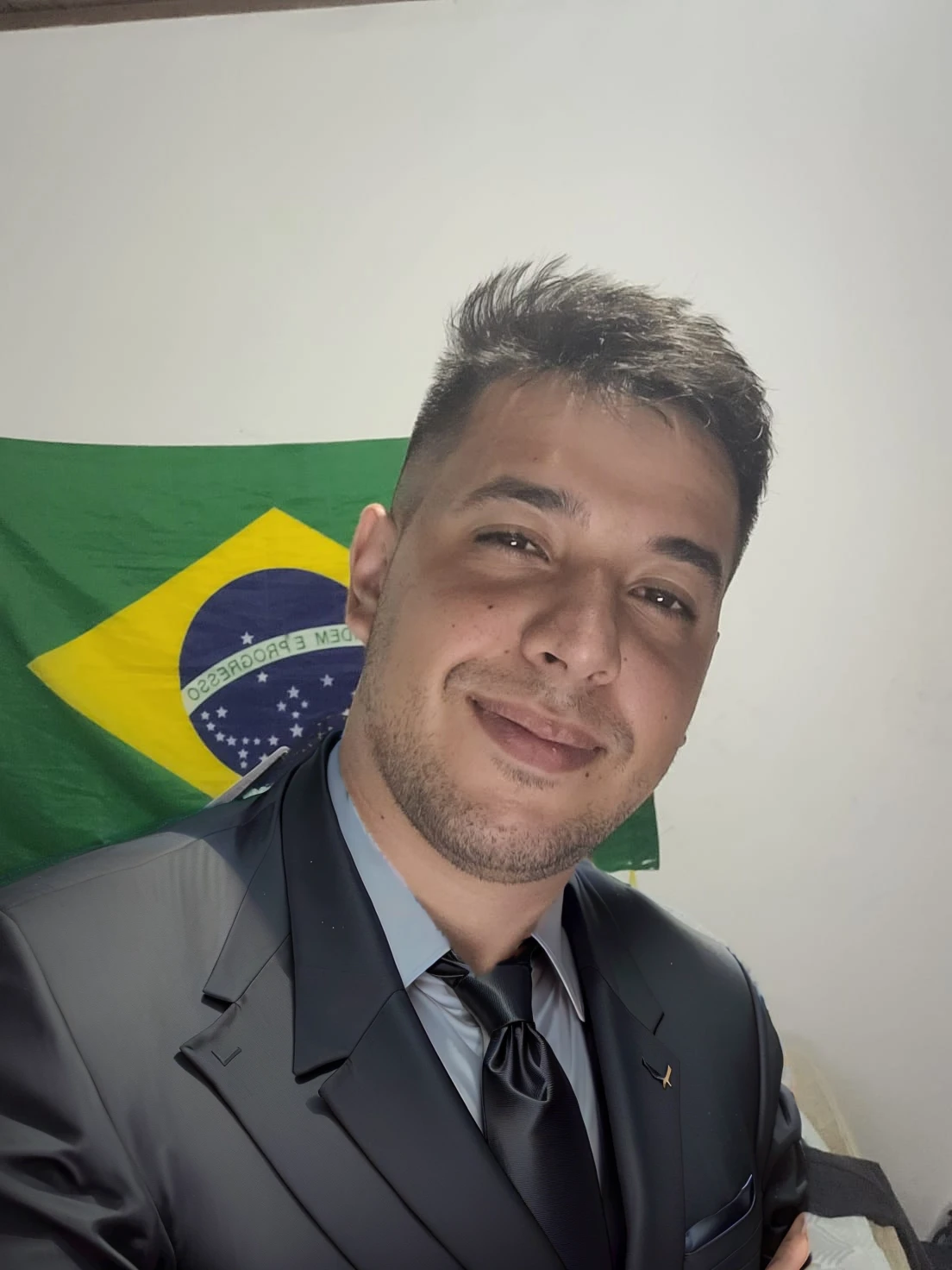 put on a black suit with a tie