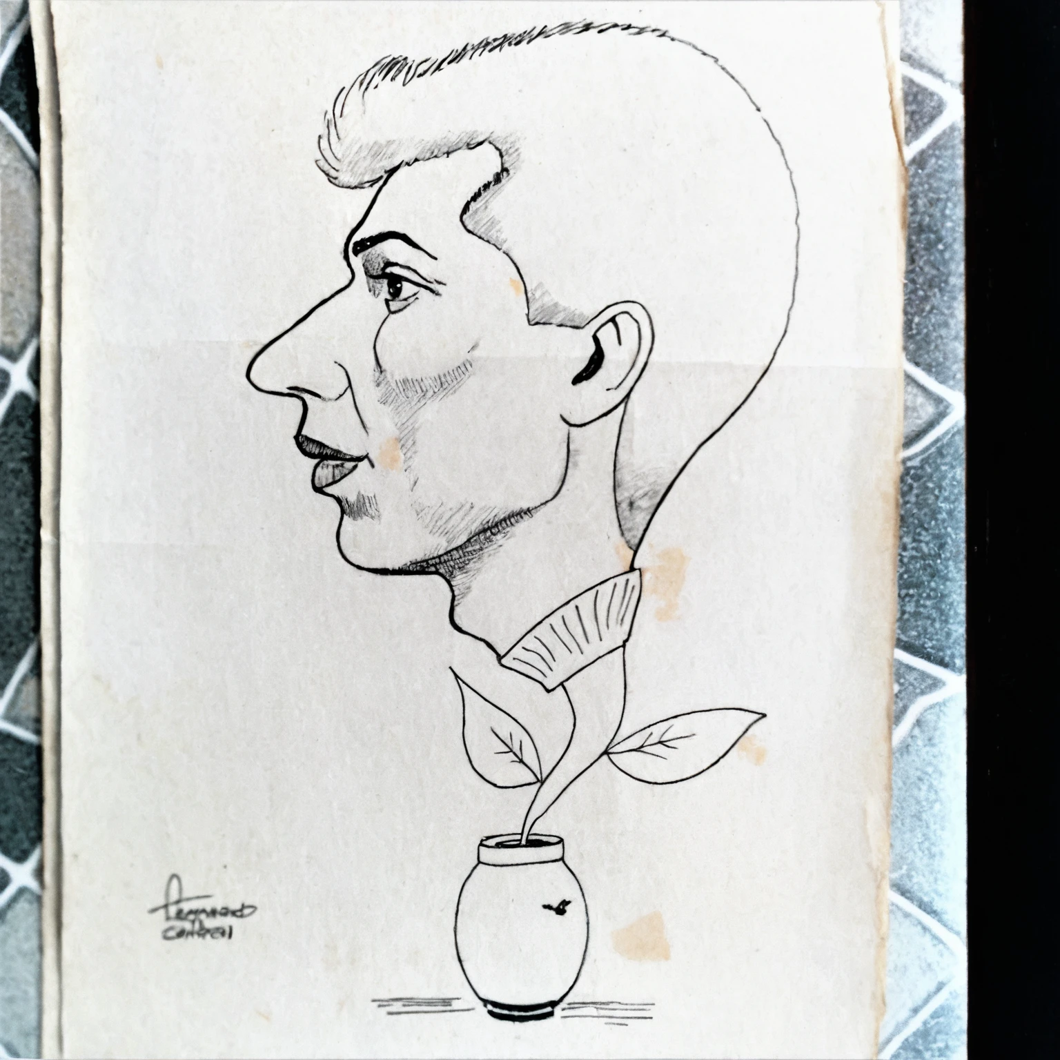 drawing of a man with a flower in a vase on a piece of paper, profile shot portrait, one head portrait, unknown artist, "Portrait of Leonard Cohen, asymmetrical portrait, centralized side profile portrait, a drawing, wore picture, Unique portrait, by Ahmed Karahisari, side portrait, head portrait, por Pál Balkay, artistic design
