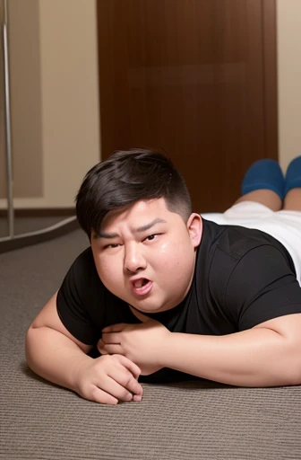 A person with a fat body , who is being teased and bullied by his parents, This person is lying on the floor crying because they are being bullied.