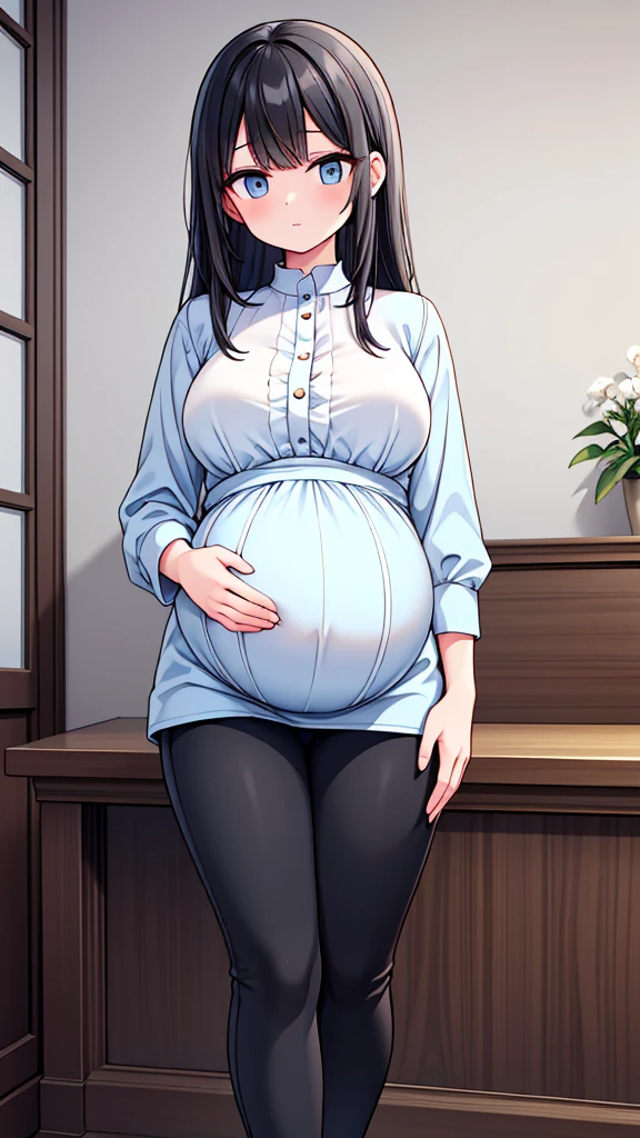 An image of a pregnant girl wearing a pair of comfortable yet stylish maternity pants and a blouse. The pants are a sleek black material, and the blouse is a soft and airy light blue fabric