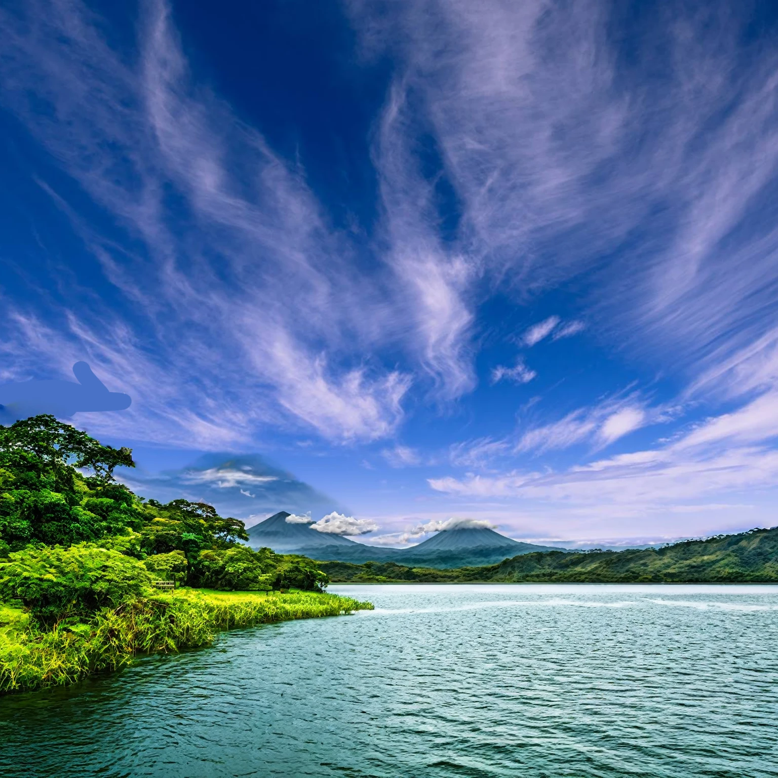 Summer sky,((Painterly style), Realistic, highly Realistic, Attention to detail, breathtakingly Realistic, High contrast realism, High Saturation Realism, Vibrant colors), (Lake in Costa Rica, Mountains visible in the distance々:1.3),(cloud:-1),Dramatic lighting, Fascinating landscape, Persuasive storytelling, Atmospheric scene, Captivating visuals, Intricate details, Strong emotions, Heavenly Beauty, A dreamlike world