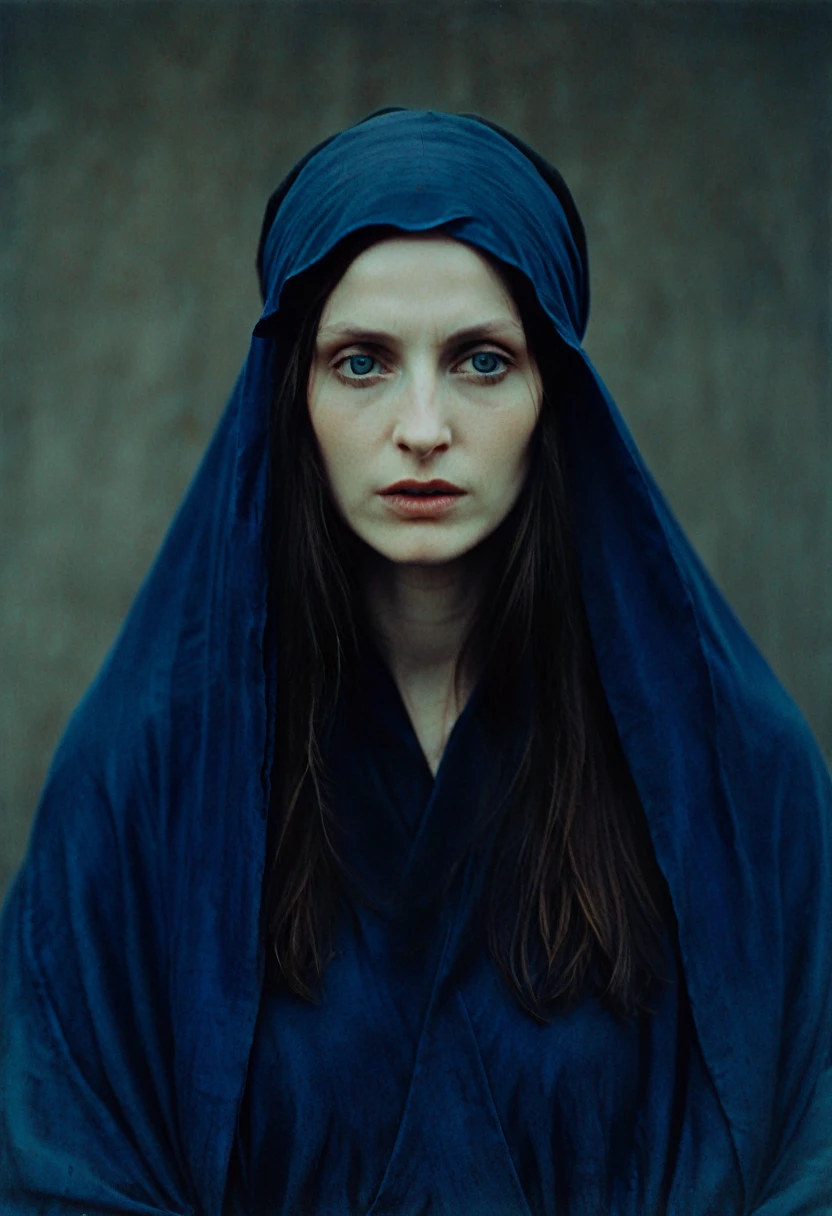 intimate portrait photograph captures A beautiful evil slavic woman, pale skin, long hair, , in his 25s, with a deep blue turban and robes, covering most of his face, revealing only his weathered eyes. by anton corbijn, inspired by the works of jean-leon gerome and Titian, Low key lighting, Cinestill 800T
