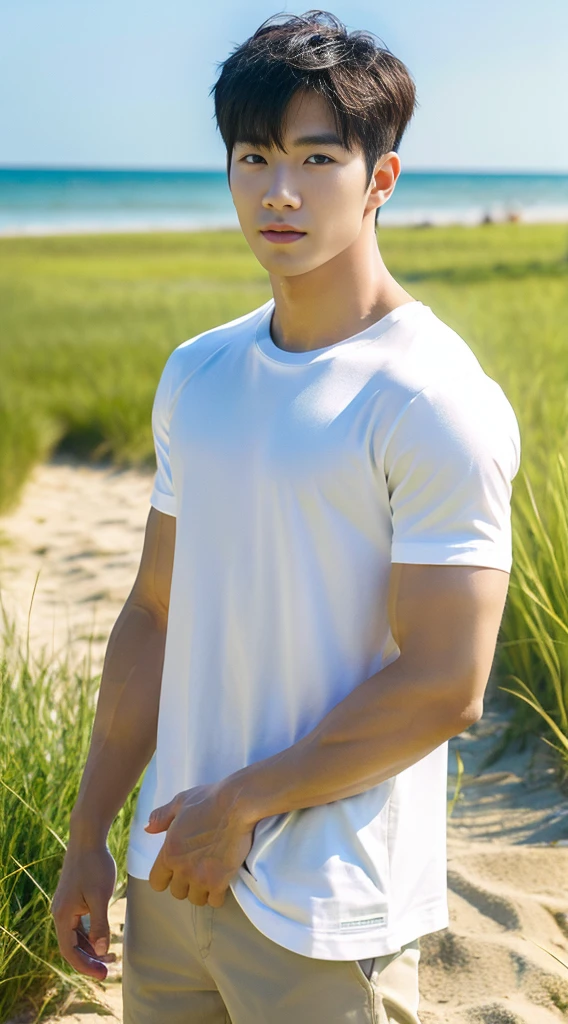 a man french with round face delicate face teen with a little bit Asian eyes round eyes , white t-shirt and jeans , muscles fit , walking on the beach with sunset