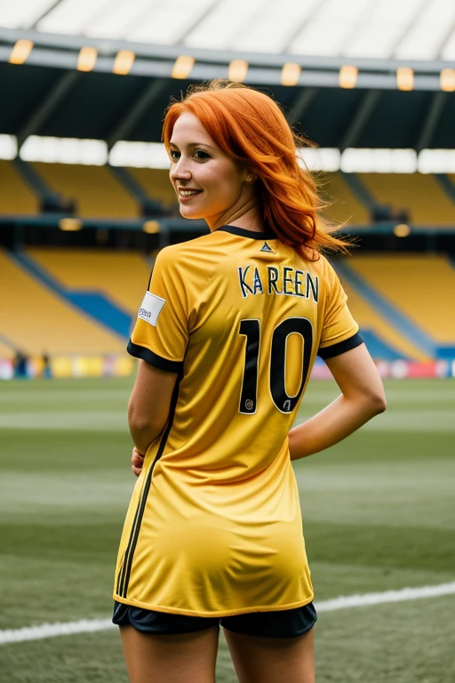 Orange haired woman wearing yellow soccer jersey with the name Karen in a soccer stadium with her back