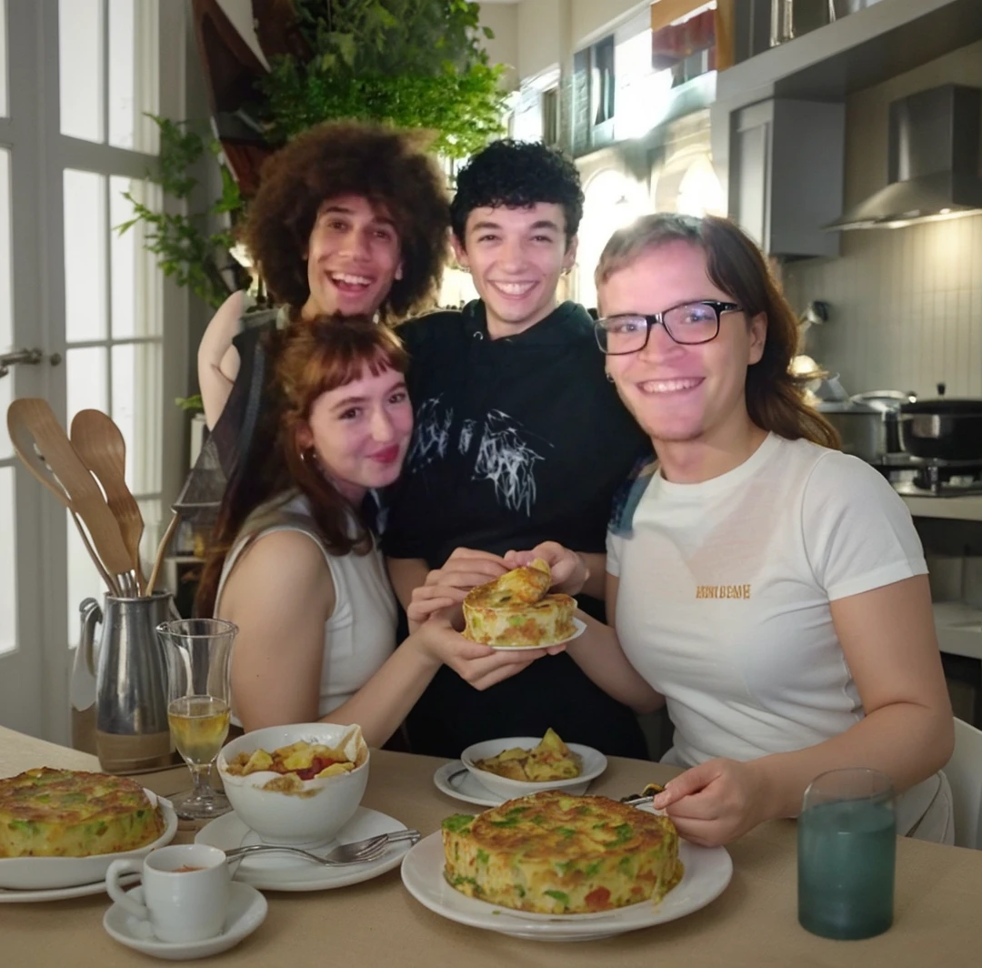 Eating Spanish potato omelette. dishes, cutlery and glasses .