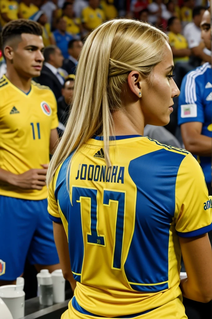Woman with blonde hair looking from behind watching the Colombia match with the Colombia national team shirt with the number 10 and the name Johana in caricature