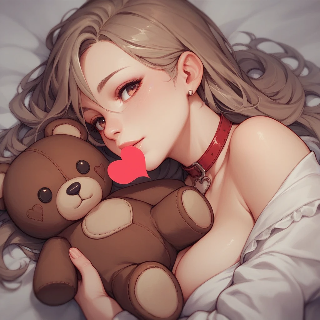 brown teddy bear with red heart