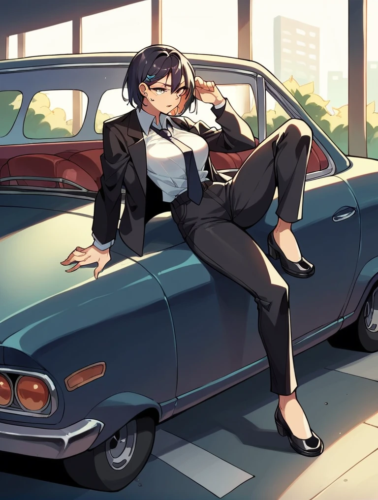 A woman wearing a black suit, tie, black long pants, and black leather shoes leans her leg on the car window.