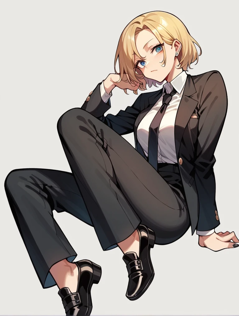 A woman wearing a black suit, tie, black long pants, black leather shoes and black stockings raises her leg in front of the camera 