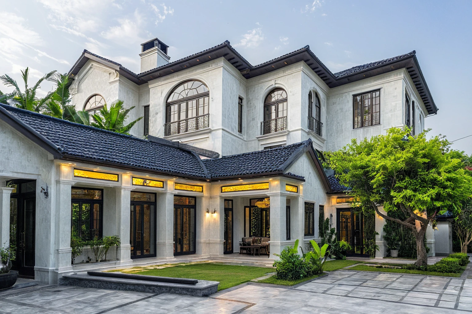 (masterpiece:1.2), best quality, photo of A two-story modern house in VietNam with dark tiles on the roof., (dark granite tiled wall:1.2), neo classic detail, tree and plant environment,daylight, streetcapes, natural light, vivid color, The exterior of an elegant single family home features large windows, a dark gray door frame.