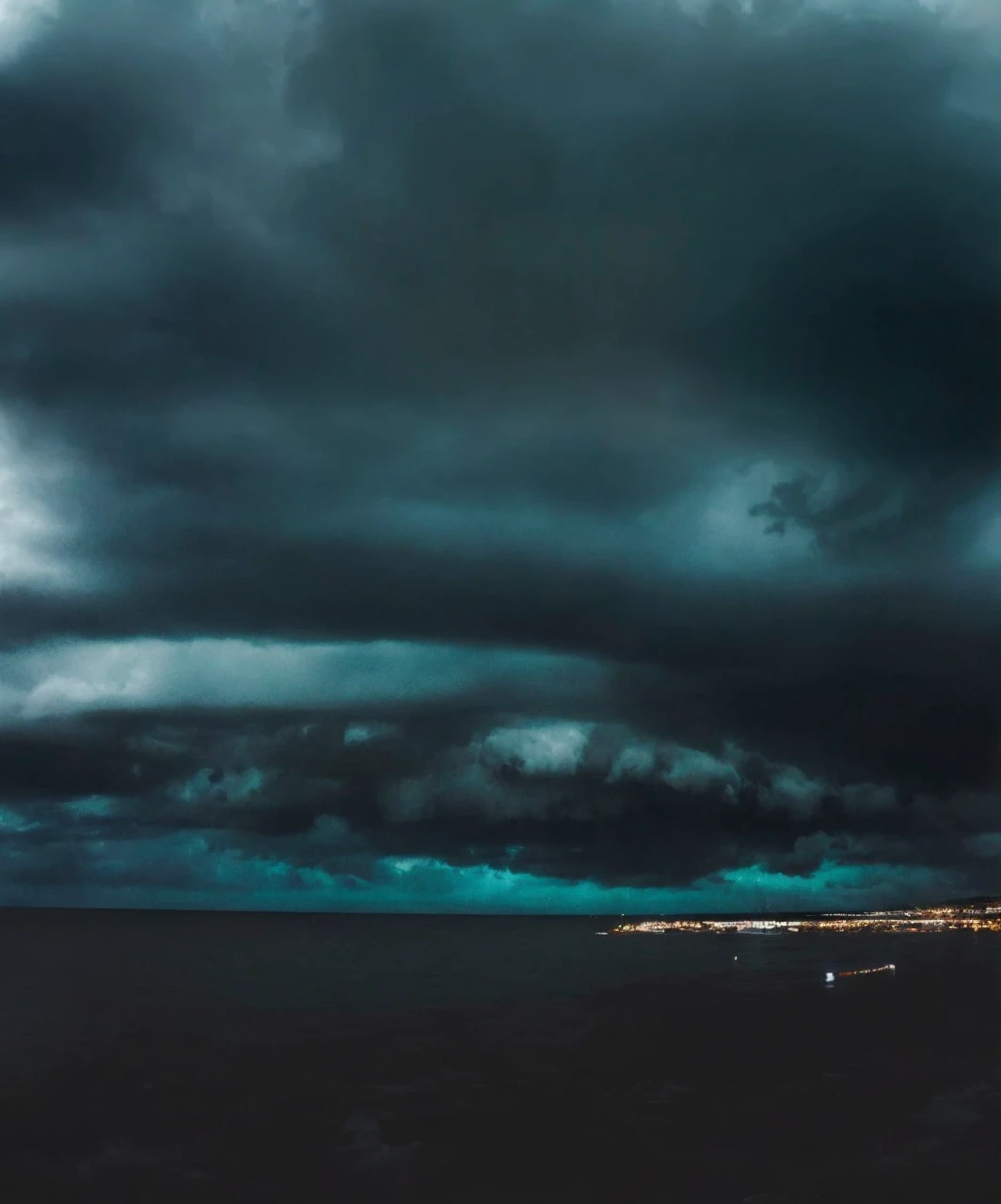 Monster over the sea made of stormy clouds. Darkness. 
